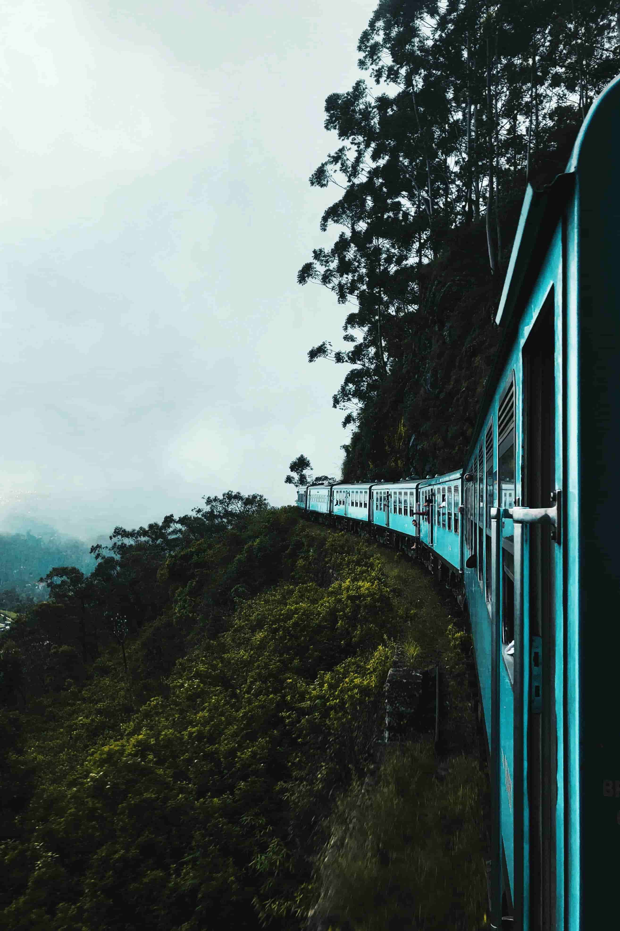 Scenic blue train ride through tea plantations on the Badulla route, Sri Lanka